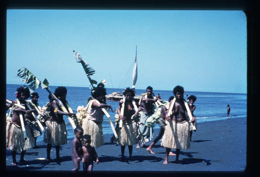 Women carrying cooking bananas