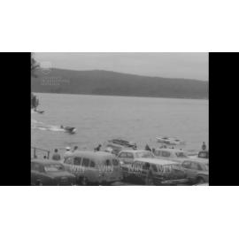 Speedboats and waterskiers