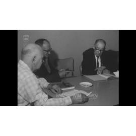 Men meeting around a table