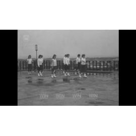 Marching girls practice on rooftop