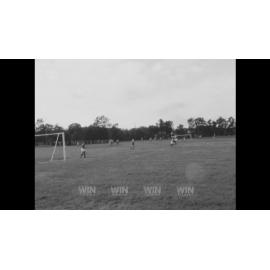 Men from Wollongong businesses playing soccer 