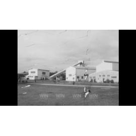 Mineworkers and a cable at a mine