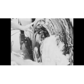 Miss Australia contestant washes a car