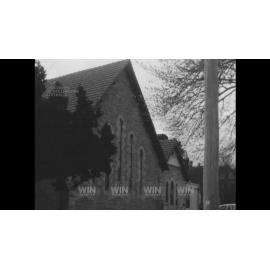 Cubs prepare a meal in a church hall