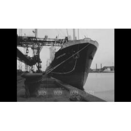 Loading material onto the Eduard Schupp in Port Kembla Harbour