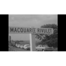 Two cars and a bus collide