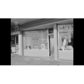 A hairdresser, in action, and interviewed