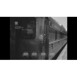 Sailors from HMS Hermes alight from a train at Wollongong Station