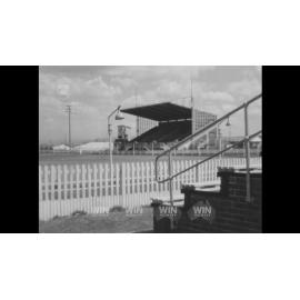 Two men walk around Wollongong Showground