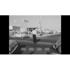 Coal truck overturned onto a Holden stationwagon