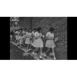 Schoolgirls paint a groovy ceiling at SCEGGS