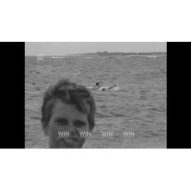 A girl is rescued from the surf