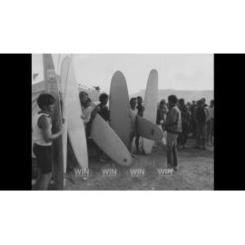 Longboard surfers compete