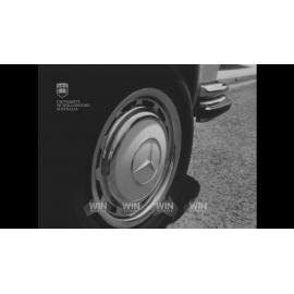 A Mercedes Benz drives slowly around Wollongong