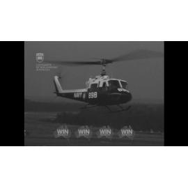 Navy helicopter brings a patient to an ambulance