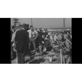 A new Bulli surfboat is christened with champagne