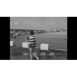A swimming carnival for children is held at Thirroul Pool