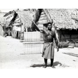 Mortlock Island Tuvi holding weaving