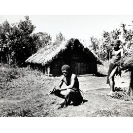 Young man from Western Highlands practising flute