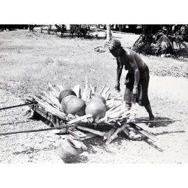 Preparing to fire pots Yabob, Madang district