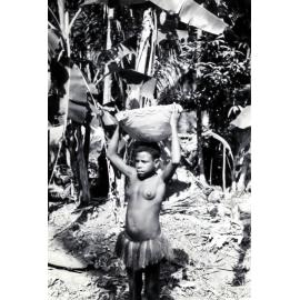 Aibom woman taking a pot to market