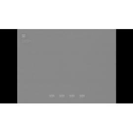 A light aircraft flies over rocky cliffs on the coast