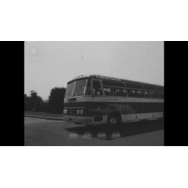 A bus brings visitors to the Port Kembla Steelworks Visitors Centre
