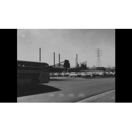 A busload of journalists join the General Manager for a tour of the Port Kembla steelworks and harbour