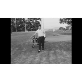 A golfer shows off his skills