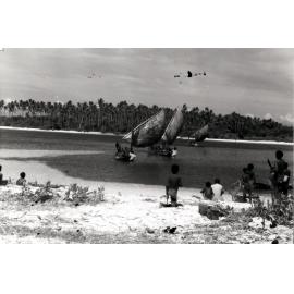 Canoes gathered for a gala day at Momote
