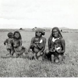 Three Papuan women with children