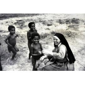 Sister Mel, OSF, with Papuan children