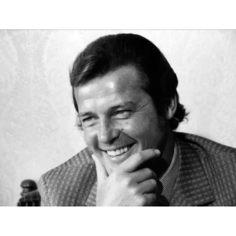 Robyn Slater and Roger Moore