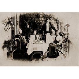 Four people sitting around a table