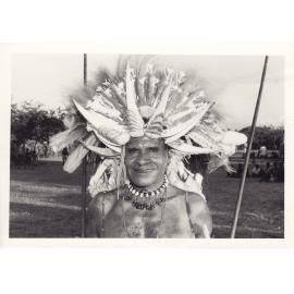 A proud father wears a headdress of hornbill beaks