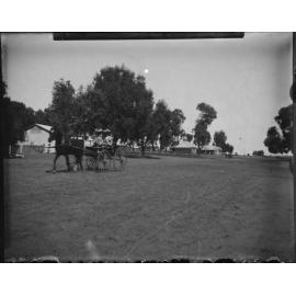 Street scene with horse and carriage