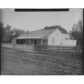 Weatherboard and iron building