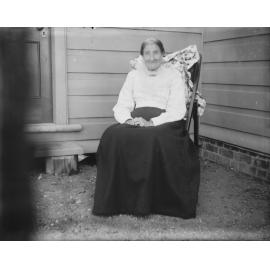 Portrait of seated woman