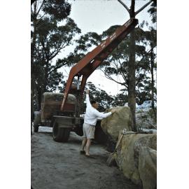 Placing rock at Mt Keira Park